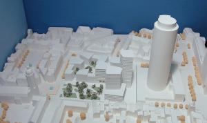 Ein Modell einer Innenstadt mit drei Hochhäusern und dem Jentower