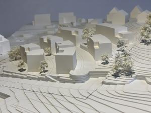 Blick von Osten auf ein Modell des neuen Wohnquartiers mit 8 Mehrfamilienhäusern