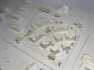 Blick von oben auf ein Modell des neuen Wohnquartiers mit 8 Mehrfamilienhäusern