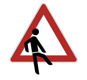 Das Symbol einer Person verlässt ein Warndreieck 