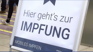 Ein Schuld mit der Aufschrift: Hier zur Impfung