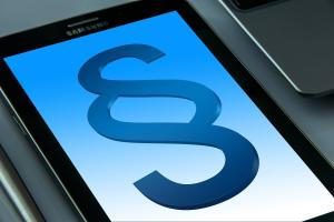 Paragraf-Zeichen auf einem Tablet