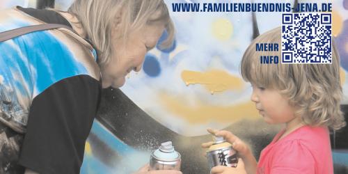 Frau mit Kind und Spraydosen 