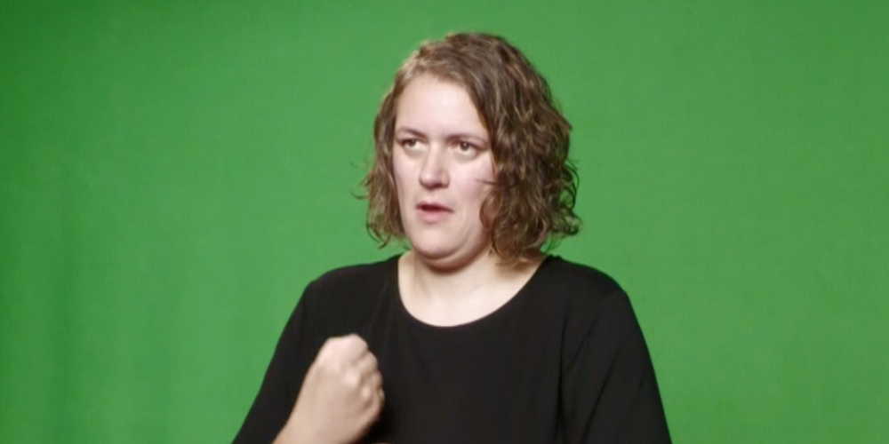 Eine Frau mit typischer Gebärde