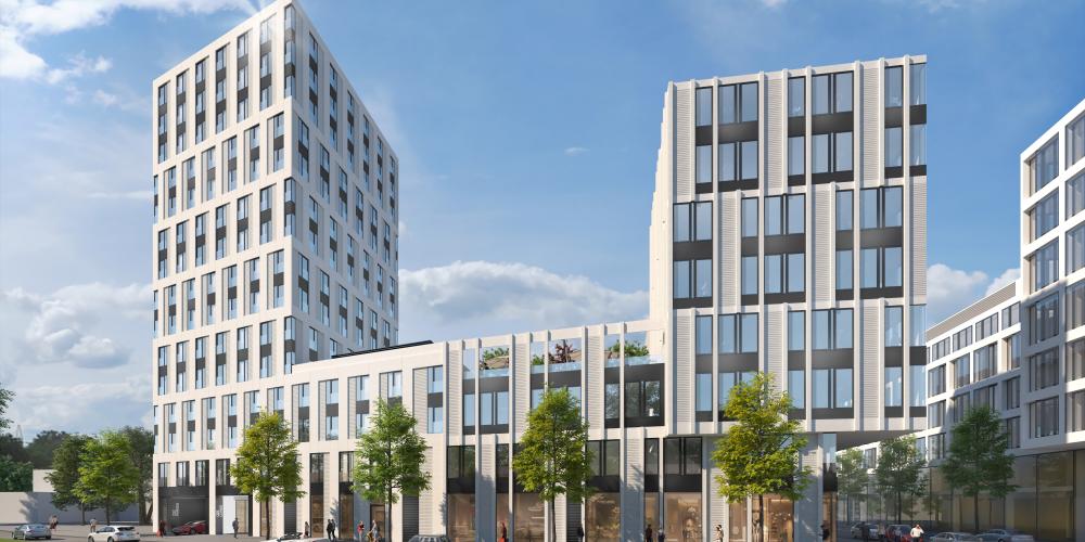 Darstellung eines Gebäudes für das Quartier 22, Blick vom Eisenbahndamm, mit Straße und Bäumen davor.