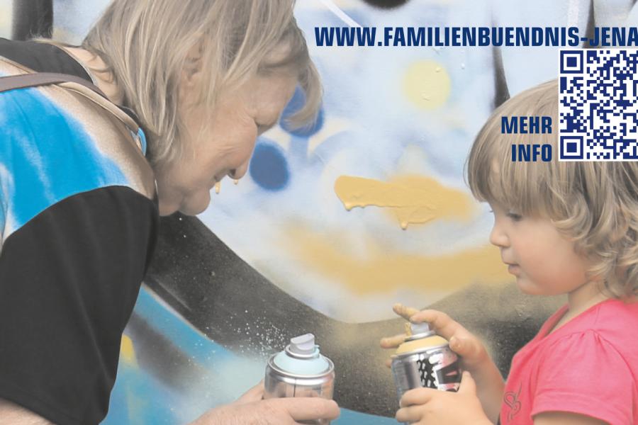 Frau mit Kind und Spraydosen 