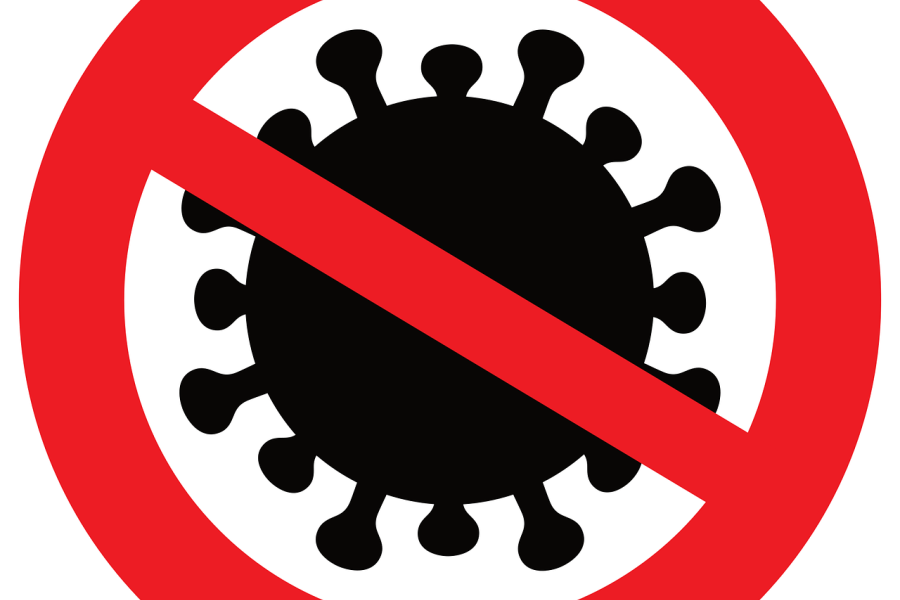 Ein symbolisches Verkehrsschild verbietet ein Virus
